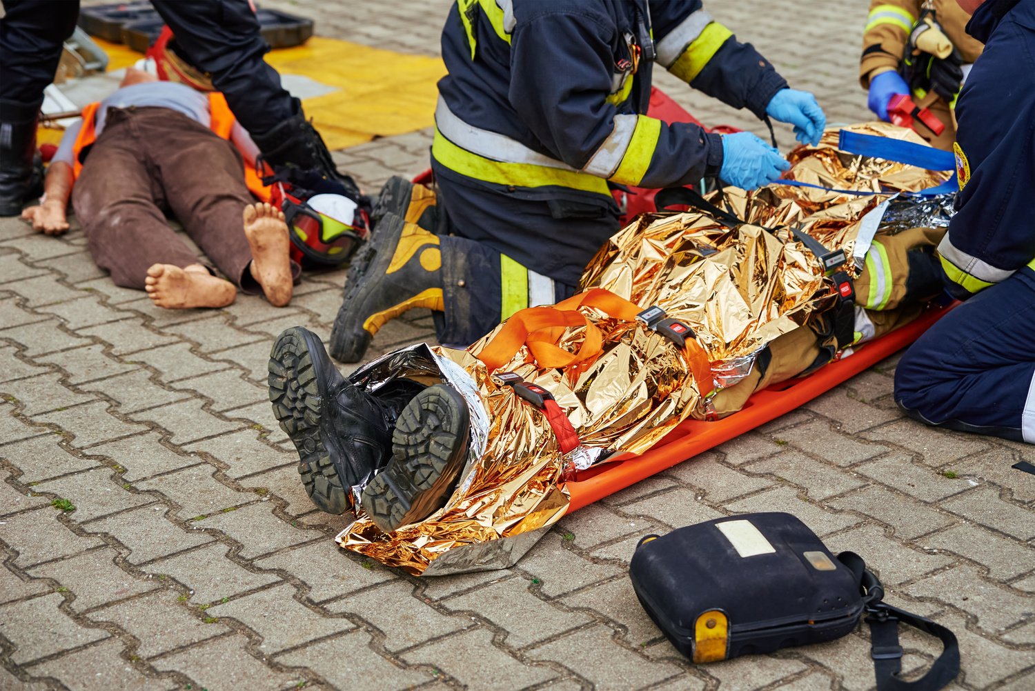 Rescuers provide first aid to the  during car road acc